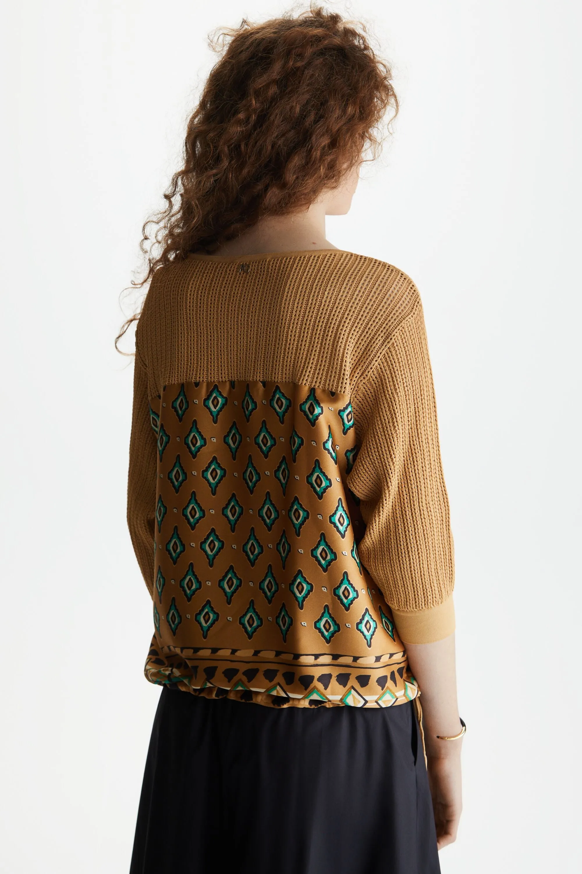 JERSEY PUNTO CALADO TWILL ESTAMPADO IKAT TRIBAL